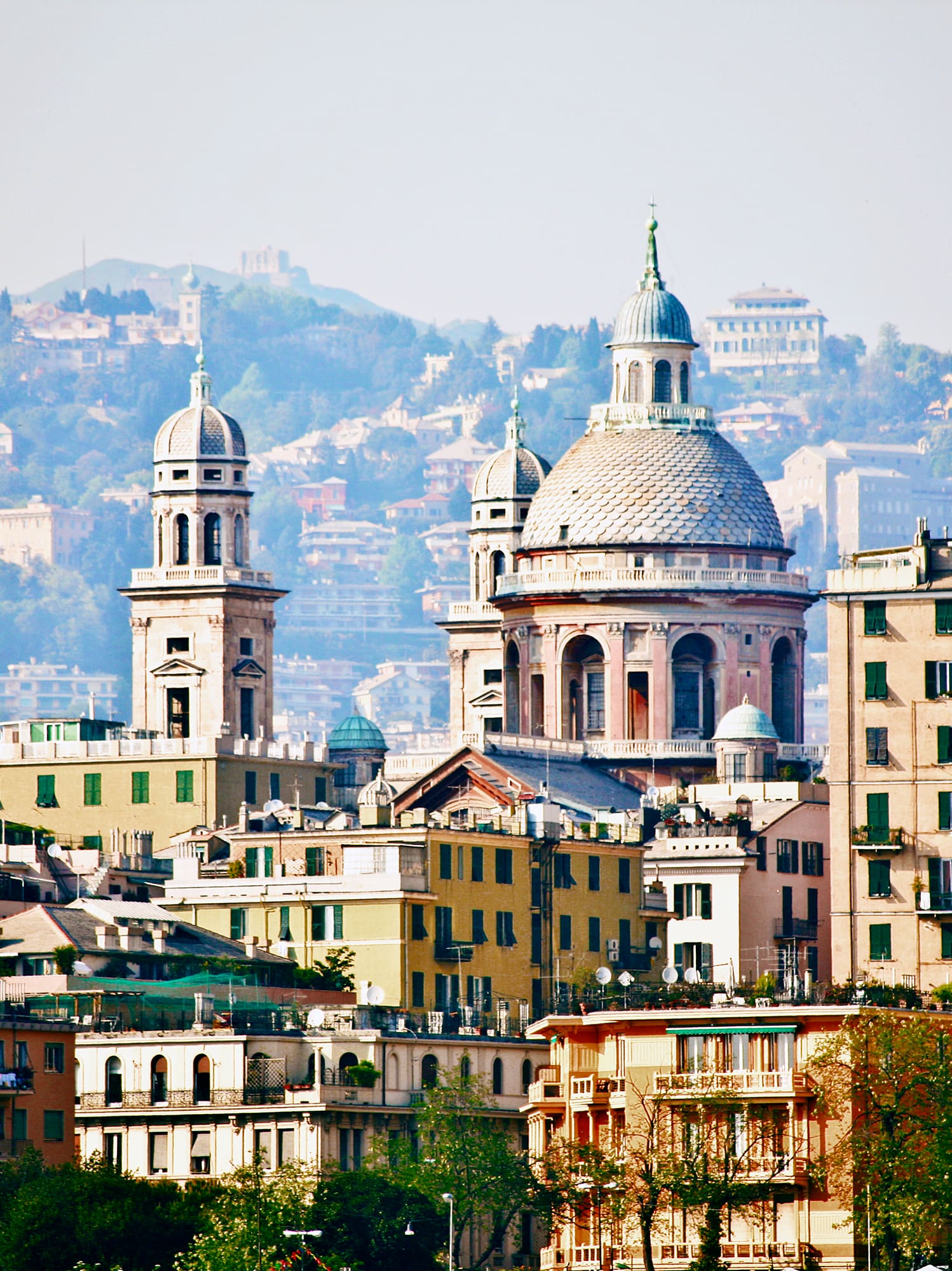 a group of buildings with a steeple
