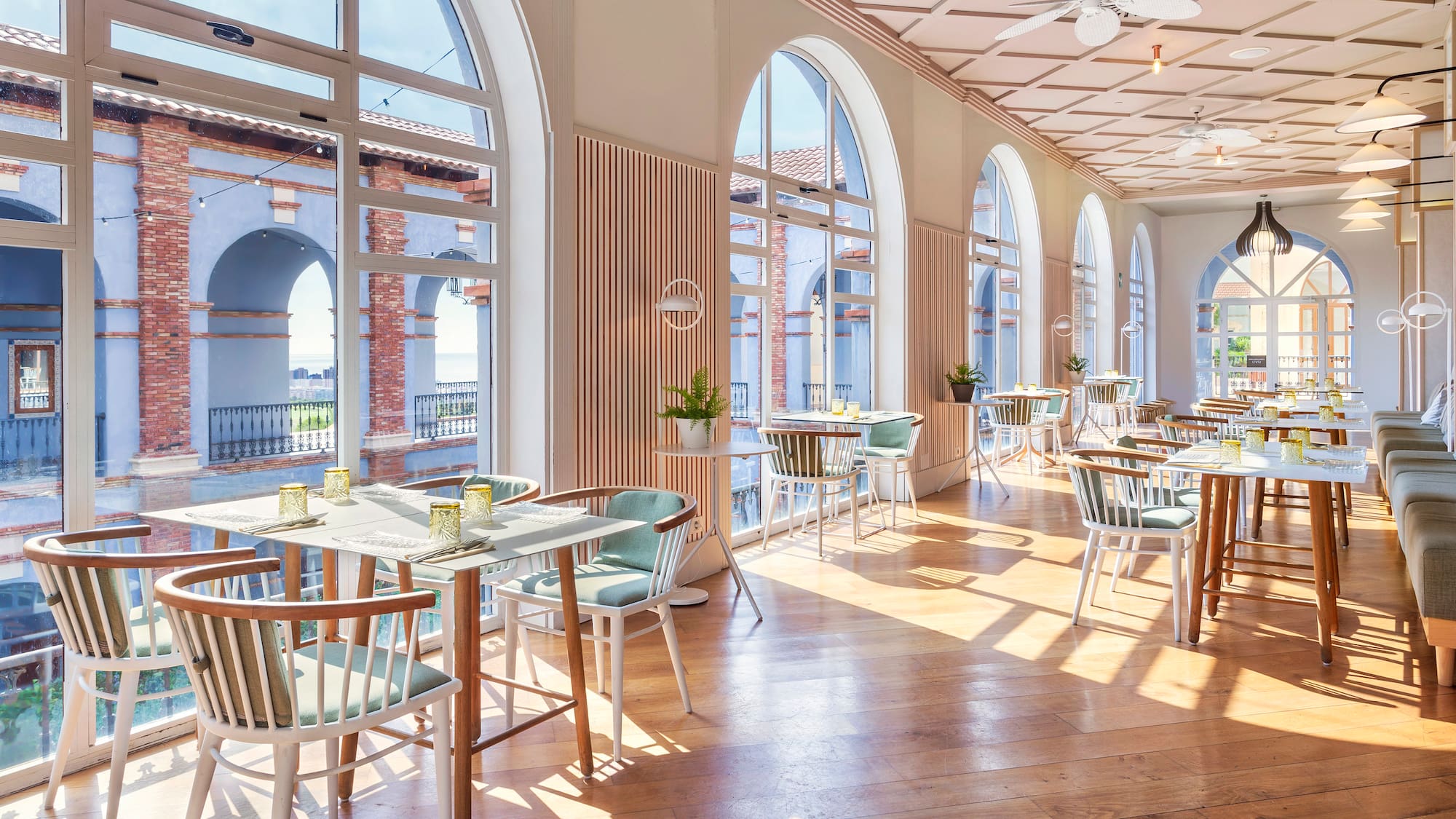 a room with tables and chairs