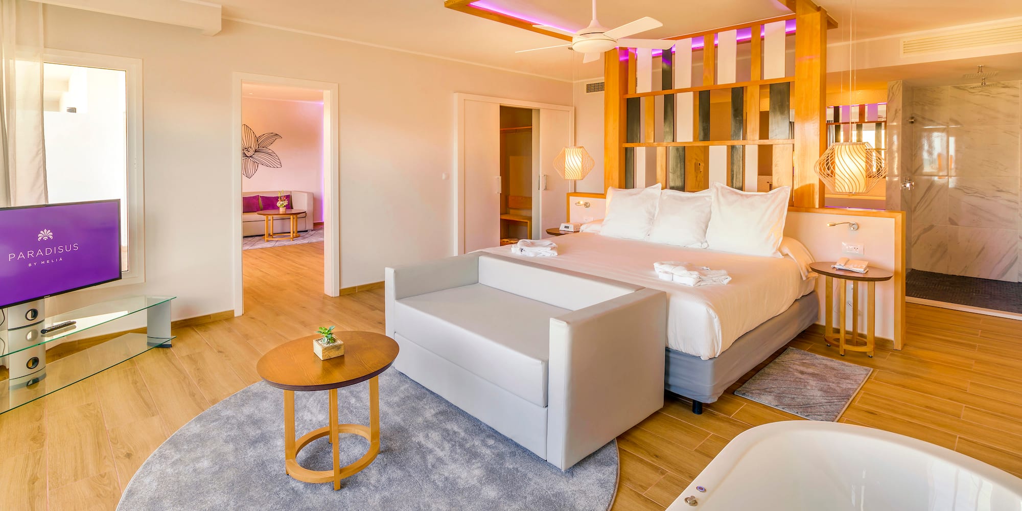 a room with a bed and a tub