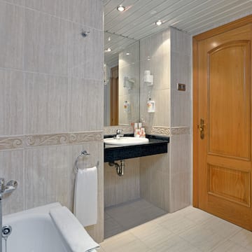 a bathroom with a sink and a bathtub