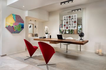 a room with a table and chairs