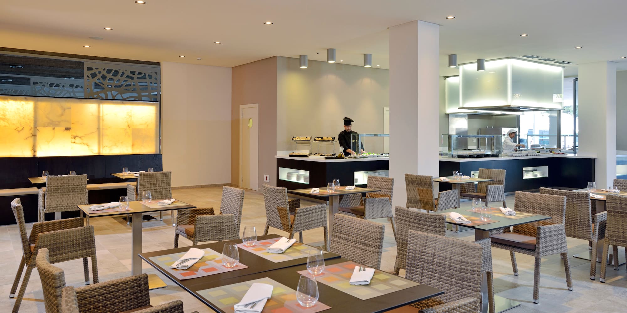 a restaurant with tables and chairs