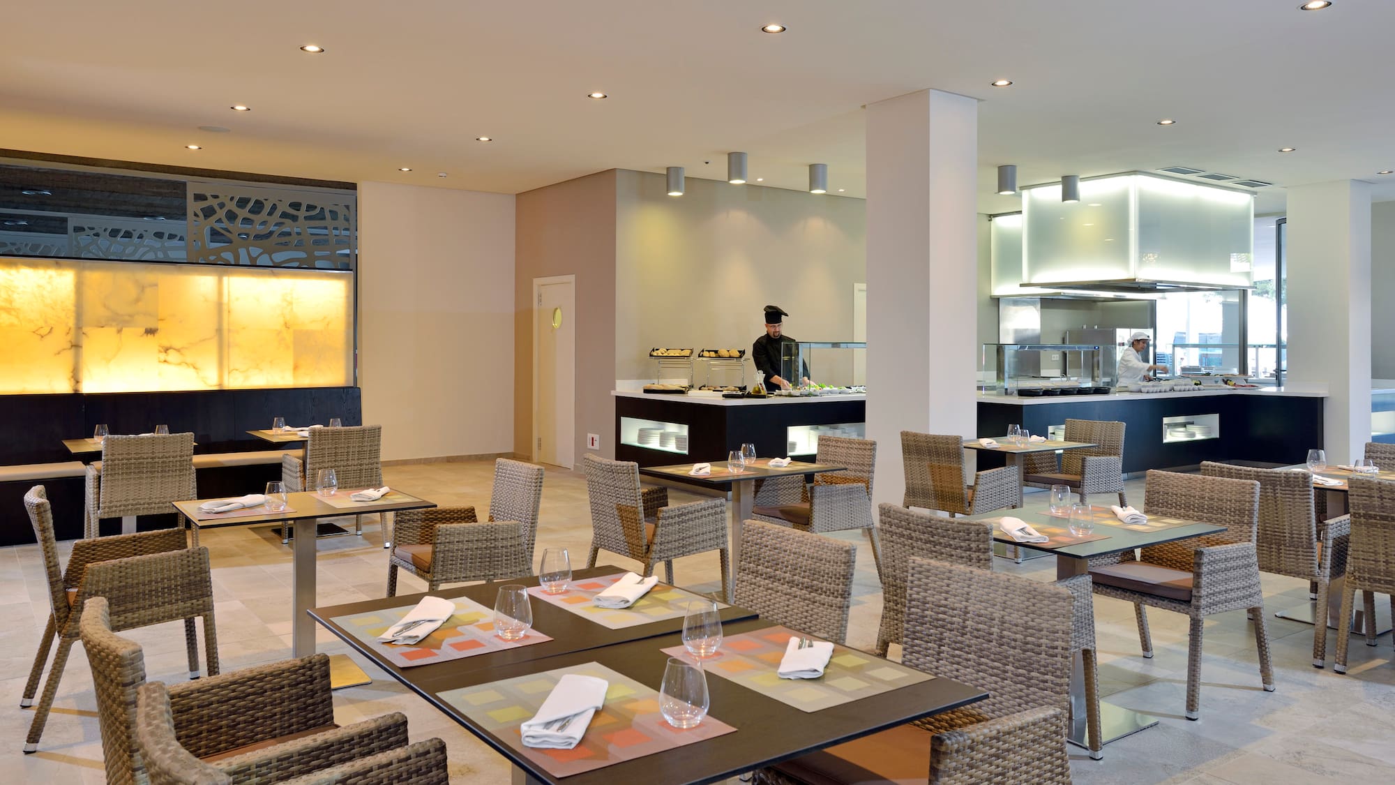 a restaurant with tables and chairs