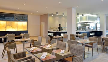 a restaurant with tables and chairs