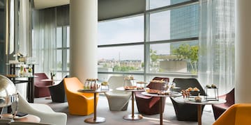 a room with tables and chairs