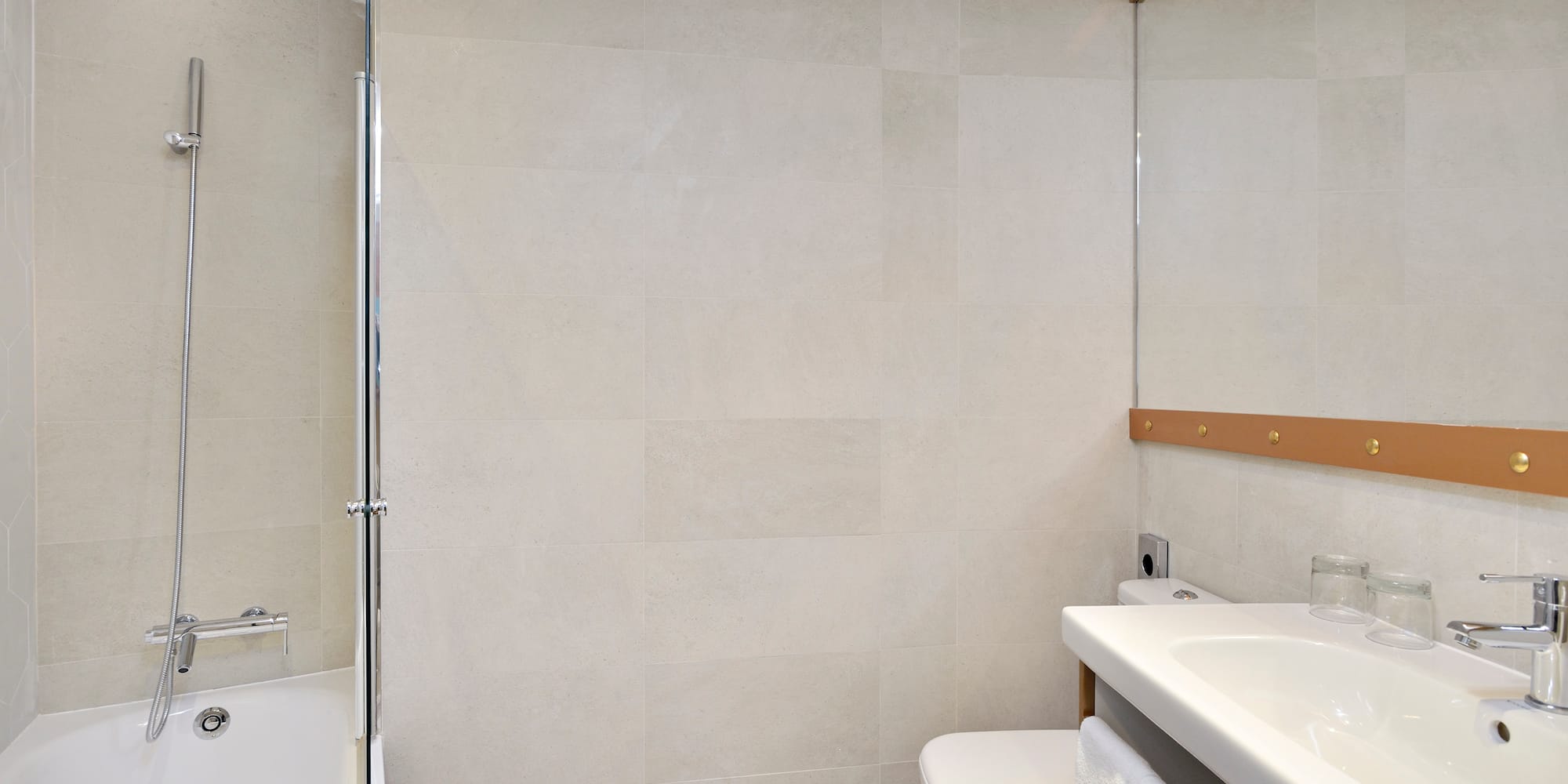 a bathroom with a shower and toilet