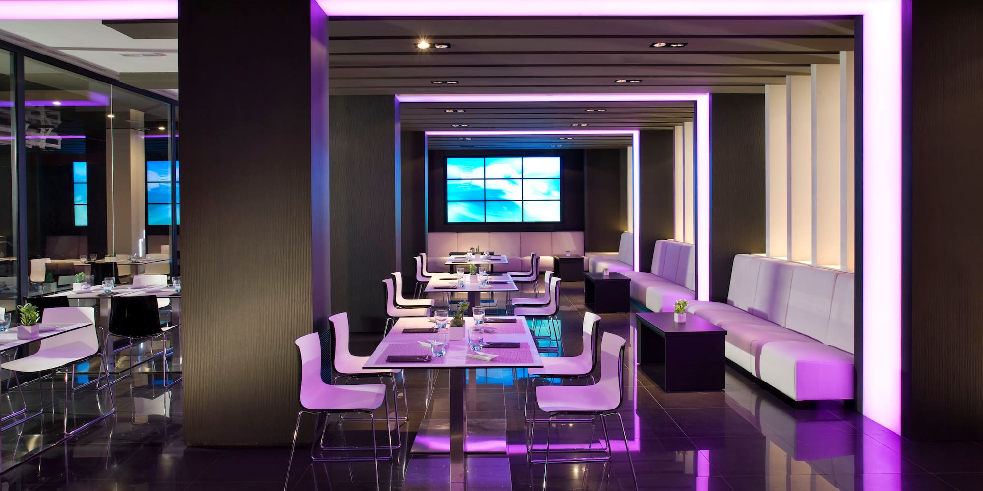 a room with tables and chairs