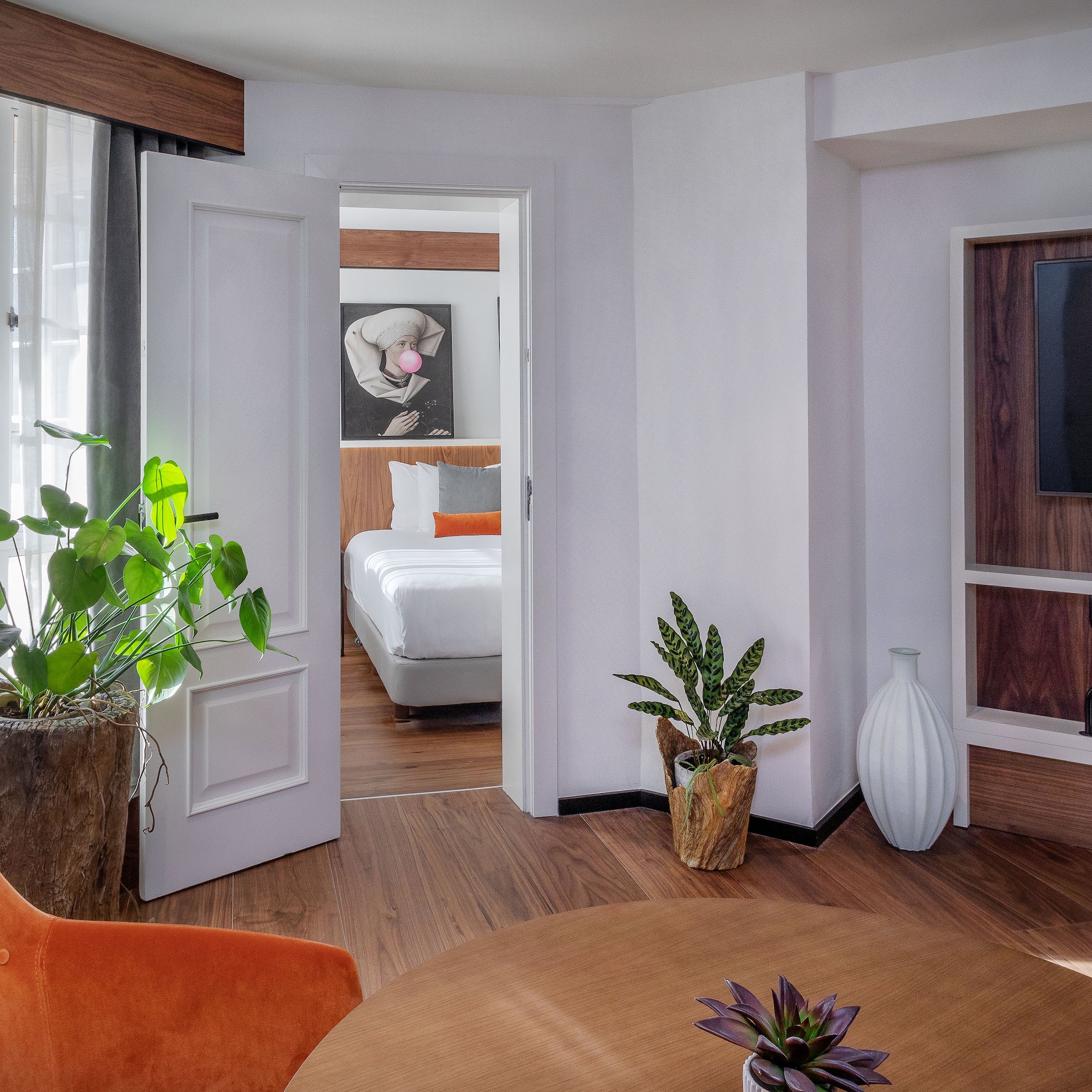 a room with a tv and a table