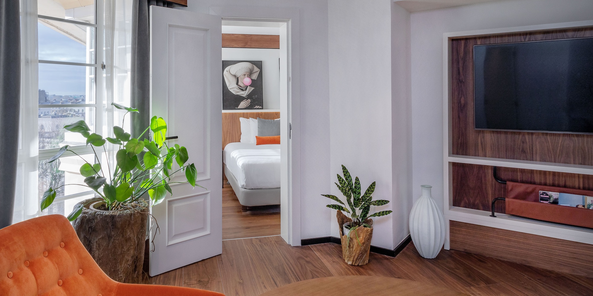 a room with a tv and a table