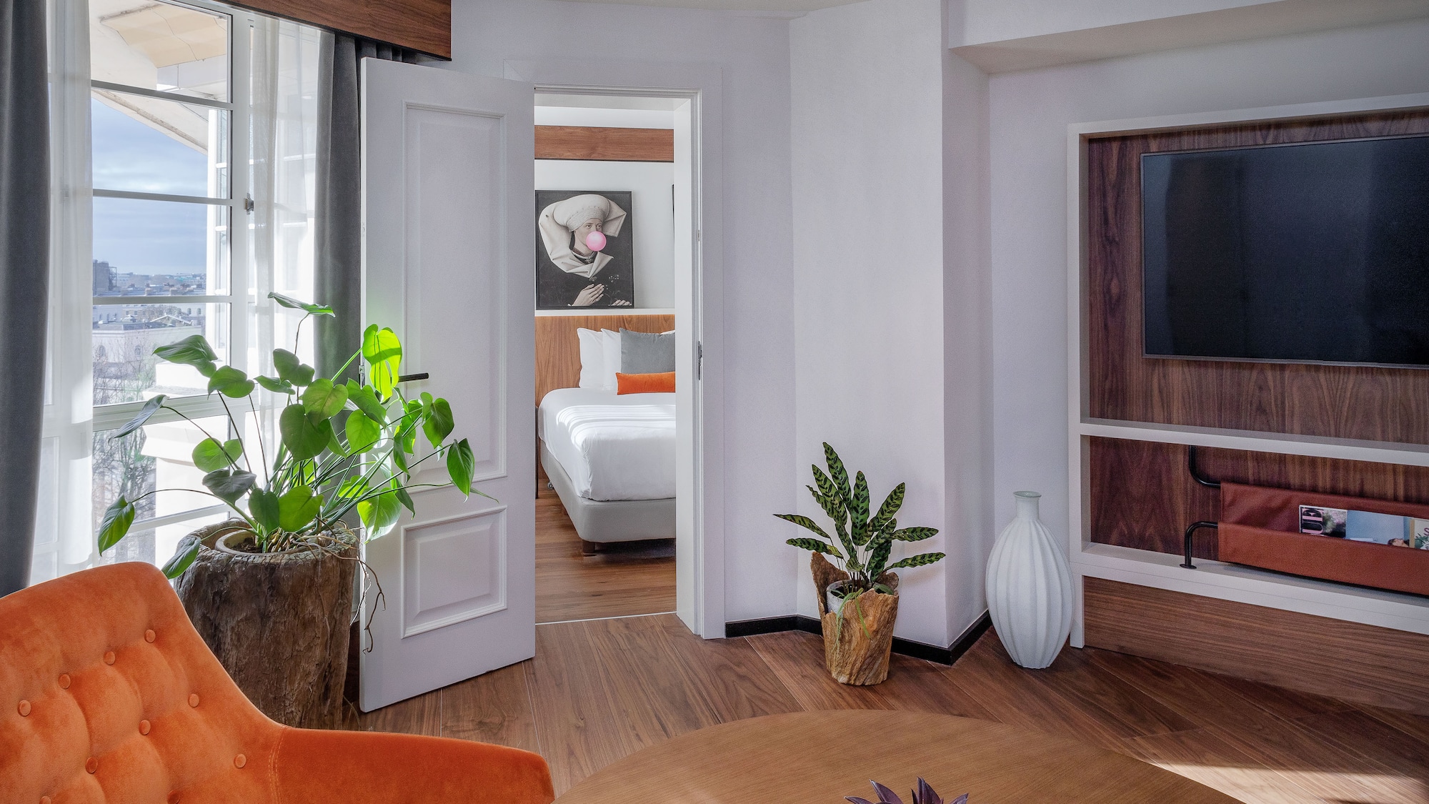 a room with a tv and a table