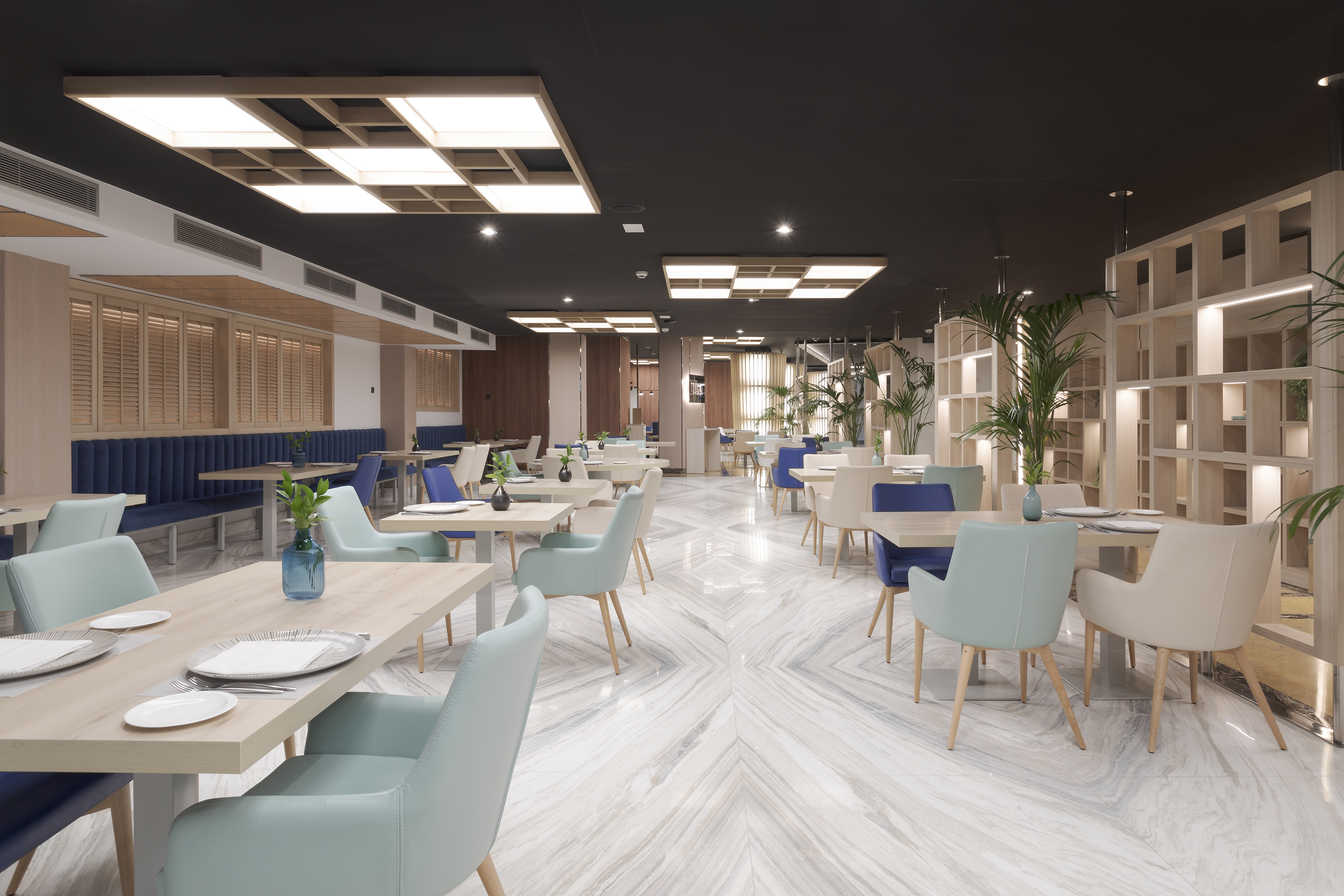 a room with tables and chairs