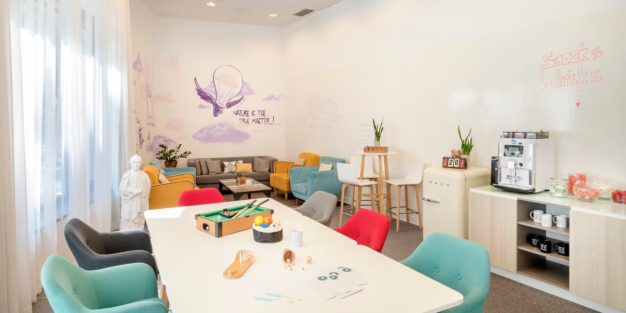 a room with a table and chairs