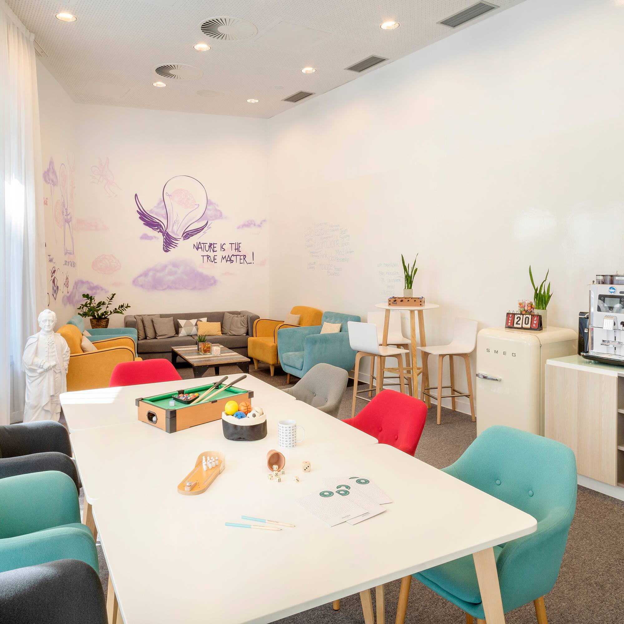 a room with a table and chairs