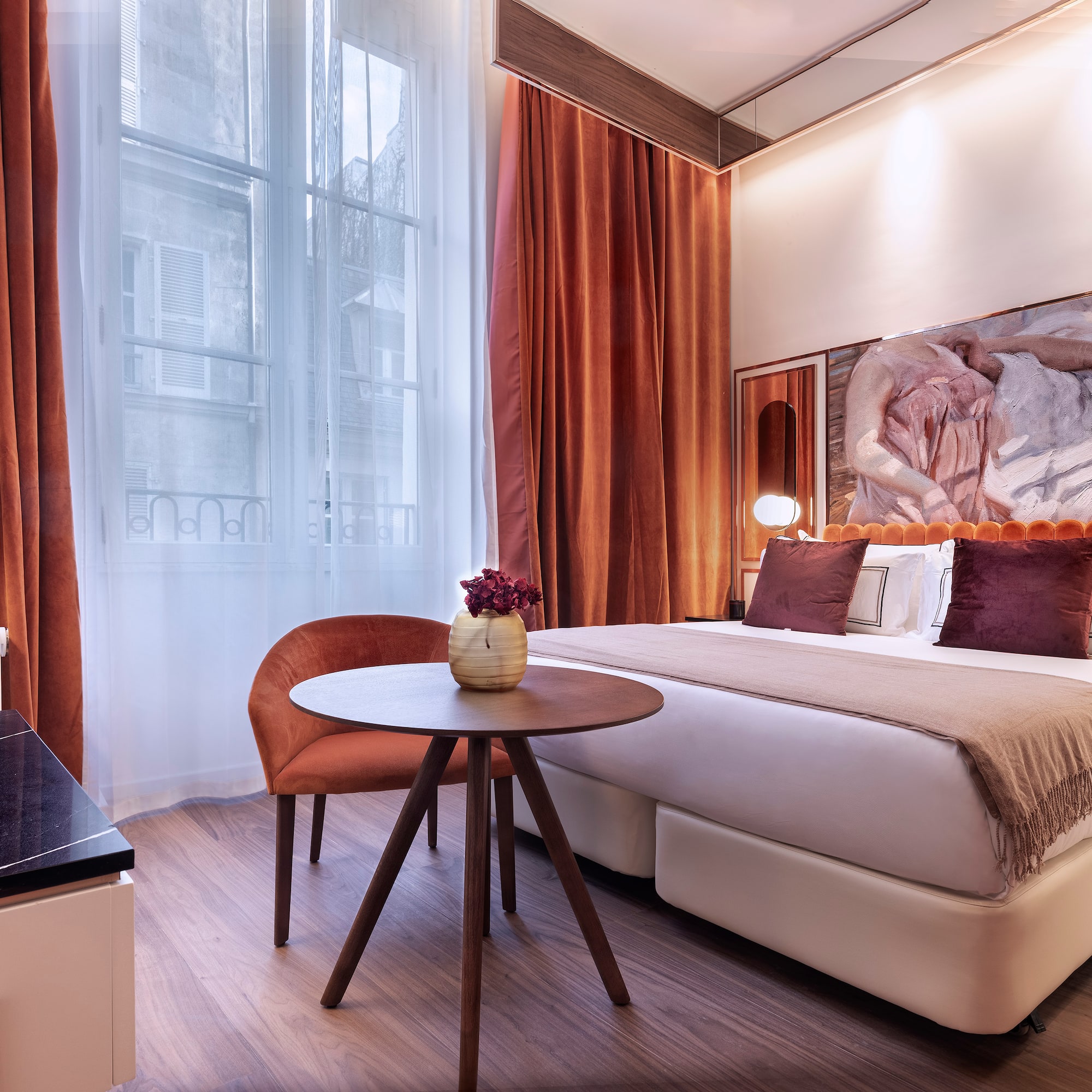 a room with a bed and a table