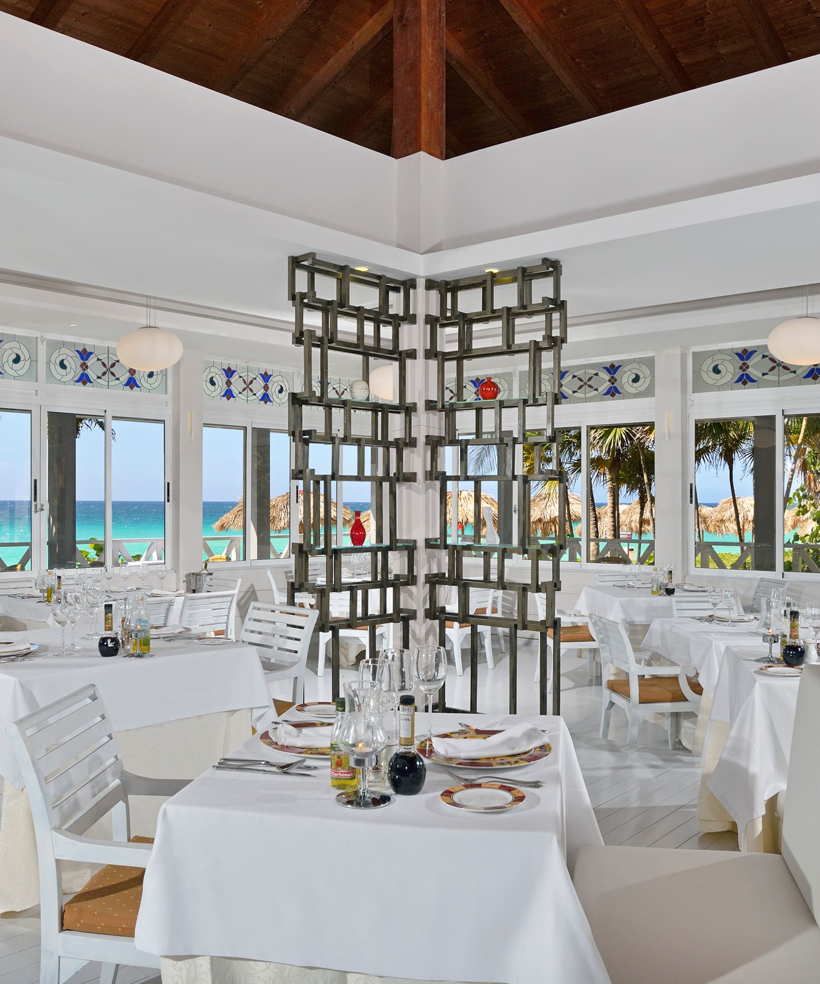 a room with tables and chairs