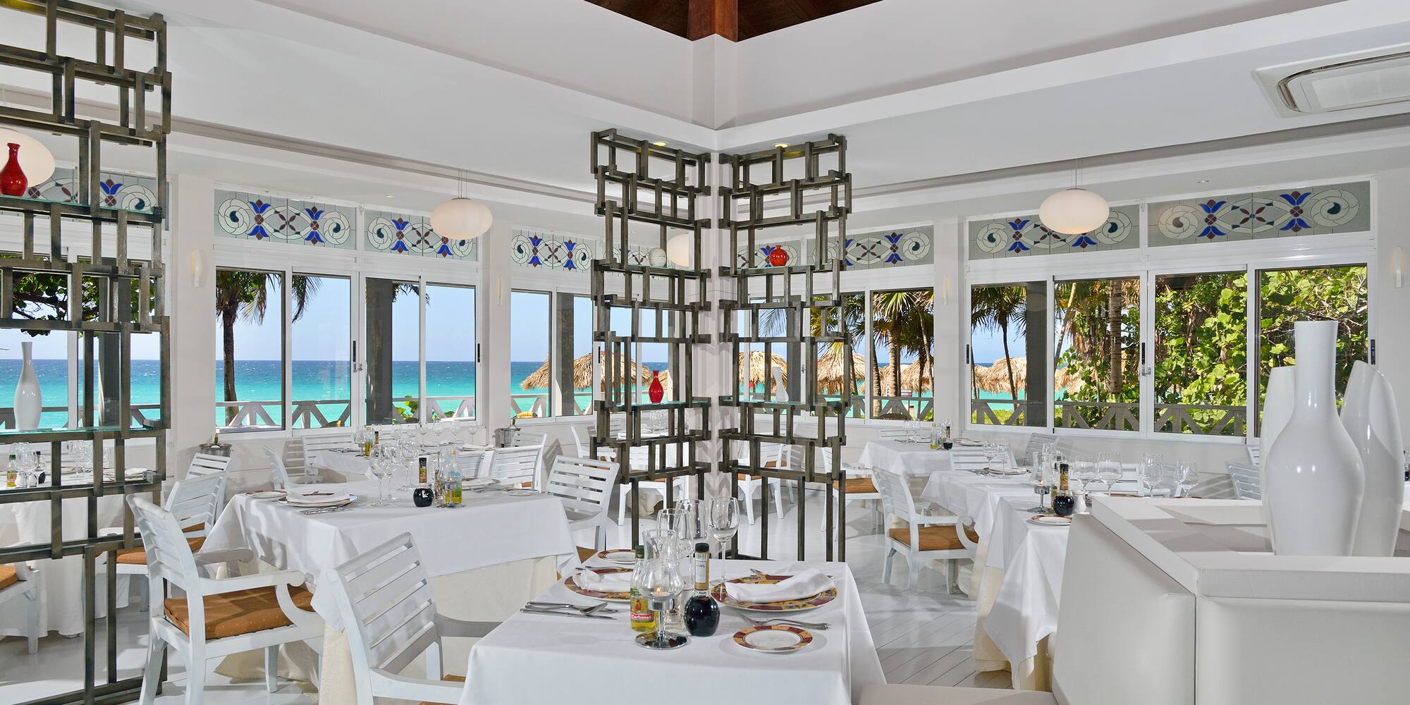 a room with tables and chairs