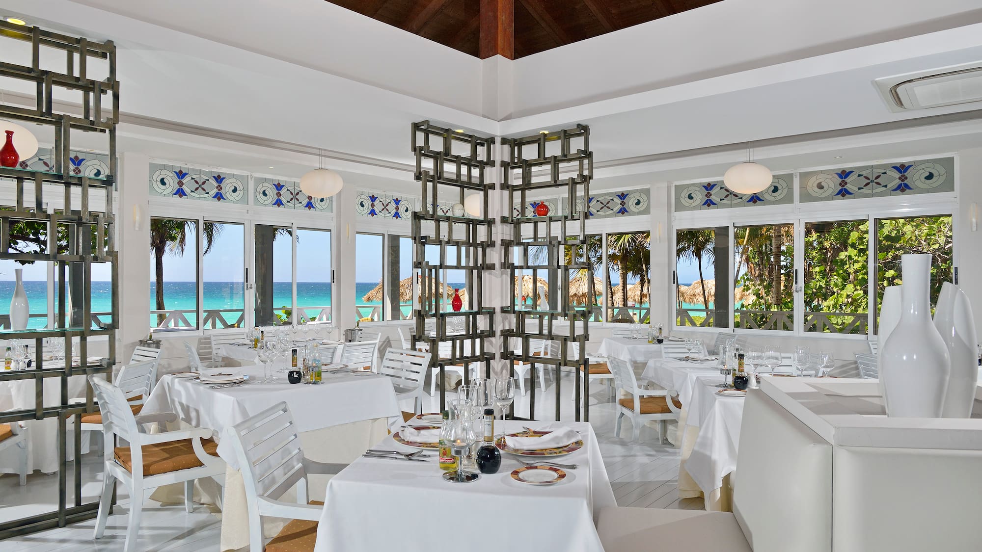 a room with tables and chairs