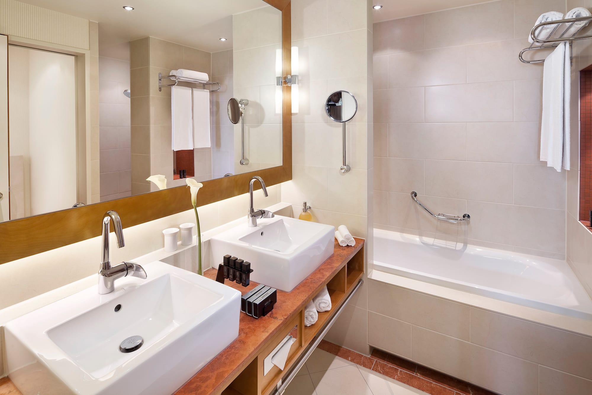 a bathroom with a mirror and sink