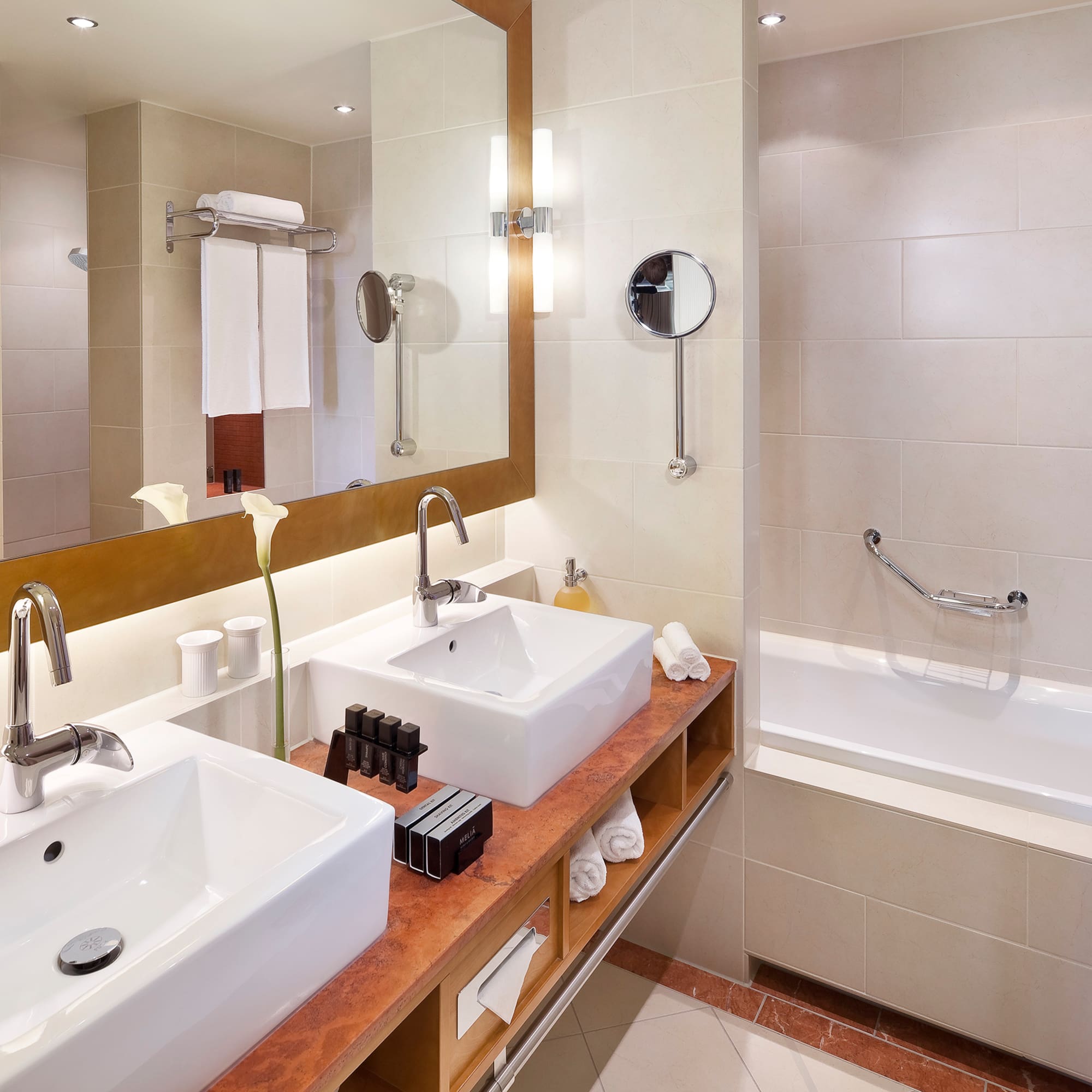 a bathroom with a mirror and sink