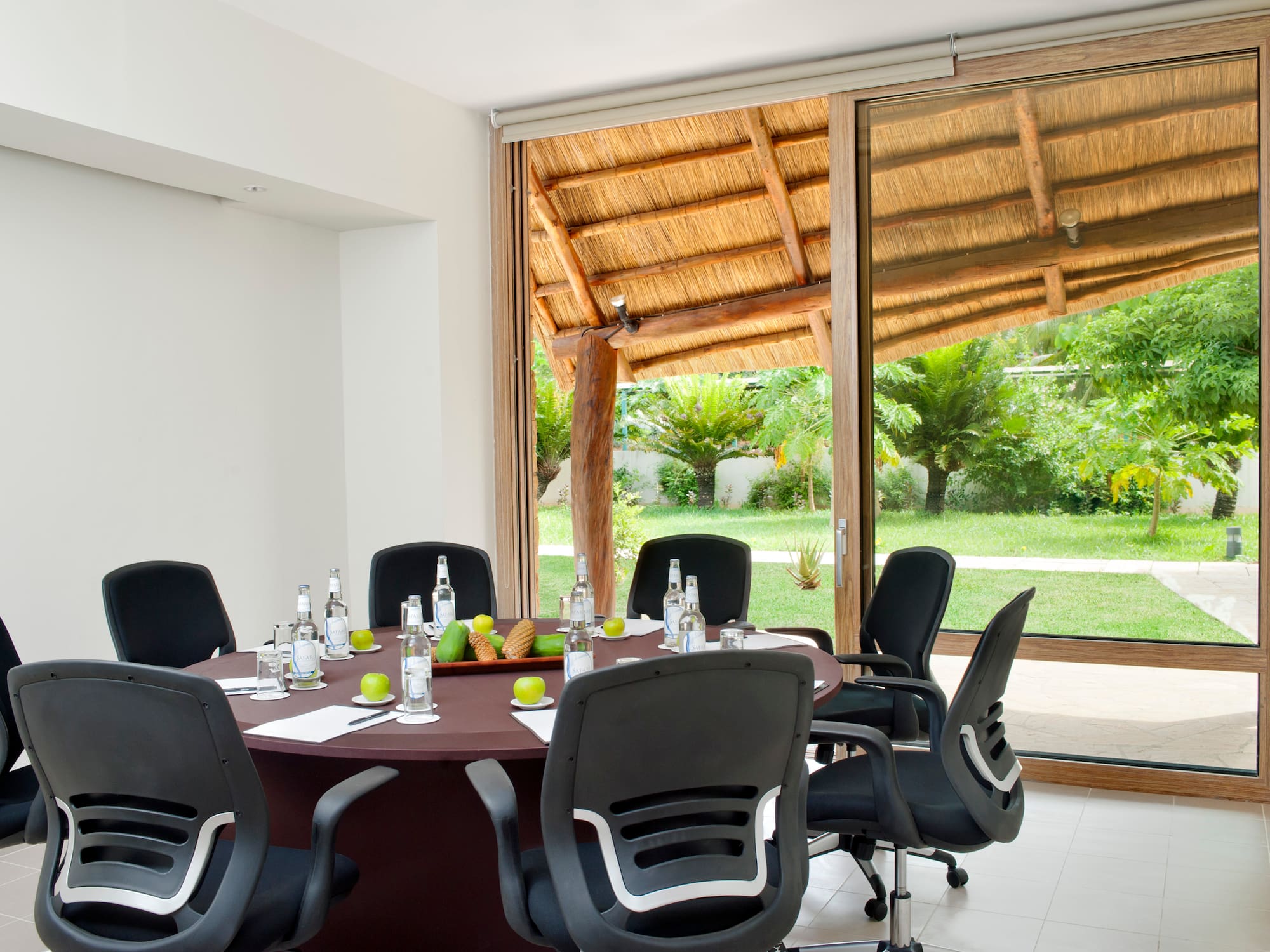 a room with a table and chairs