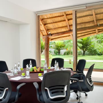 a room with a table and chairs