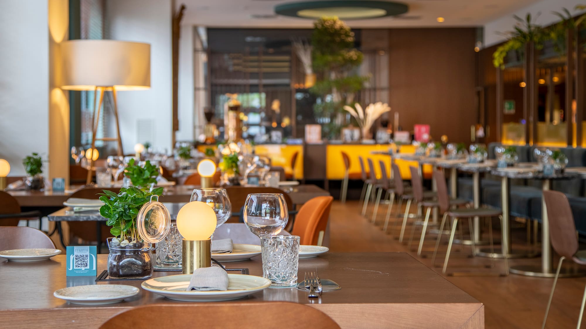 a restaurant with tables and chairs