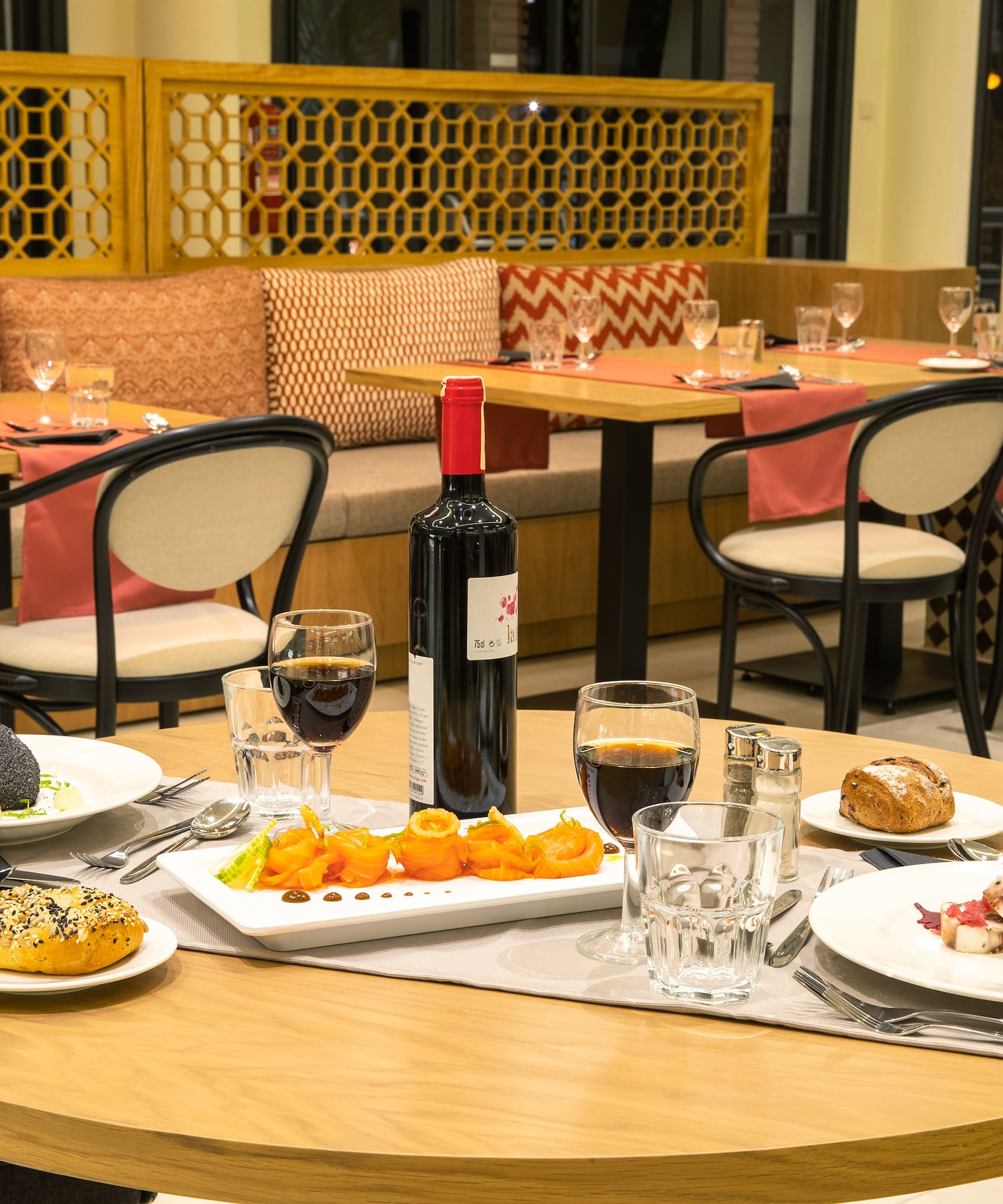 a table with food and wine on it