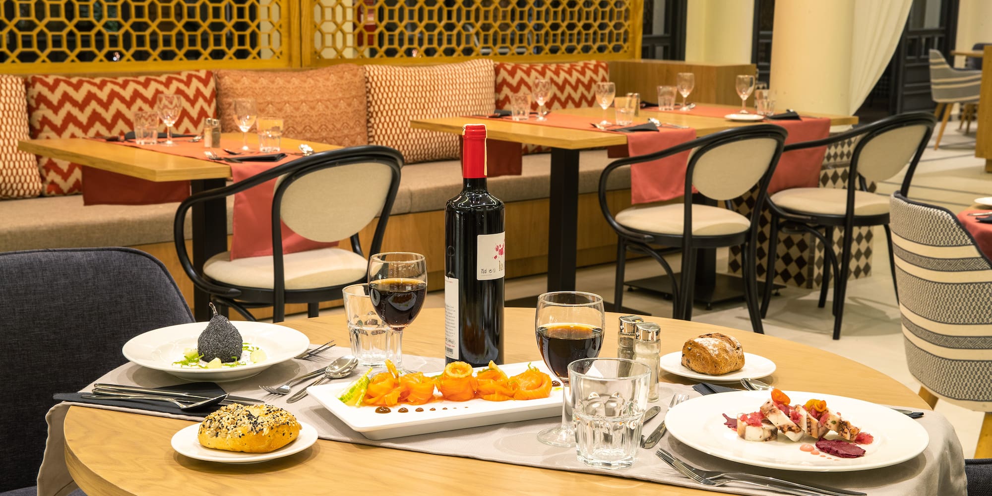 a table with food and wine on it