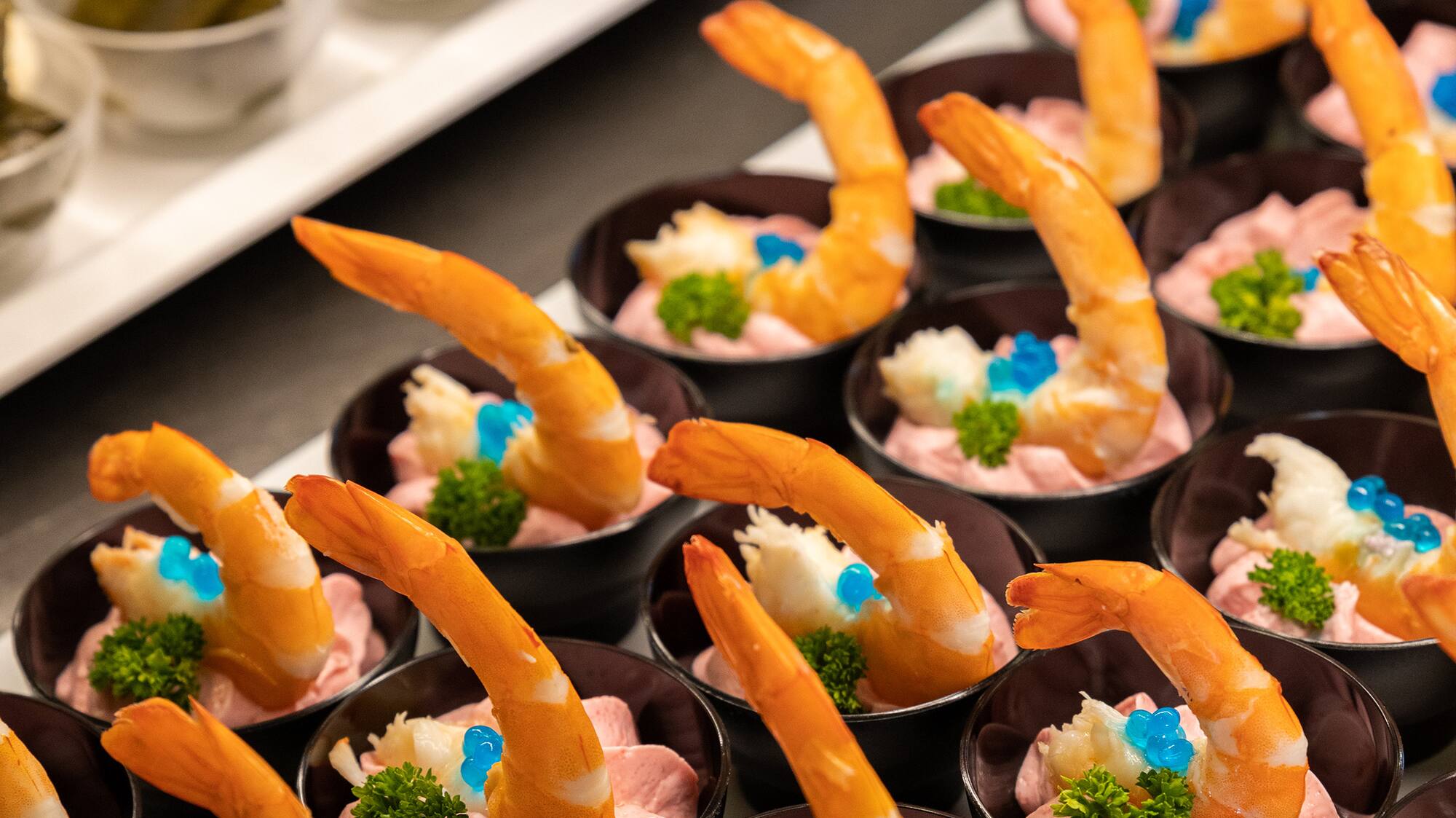 a tray of shrimp appetizers