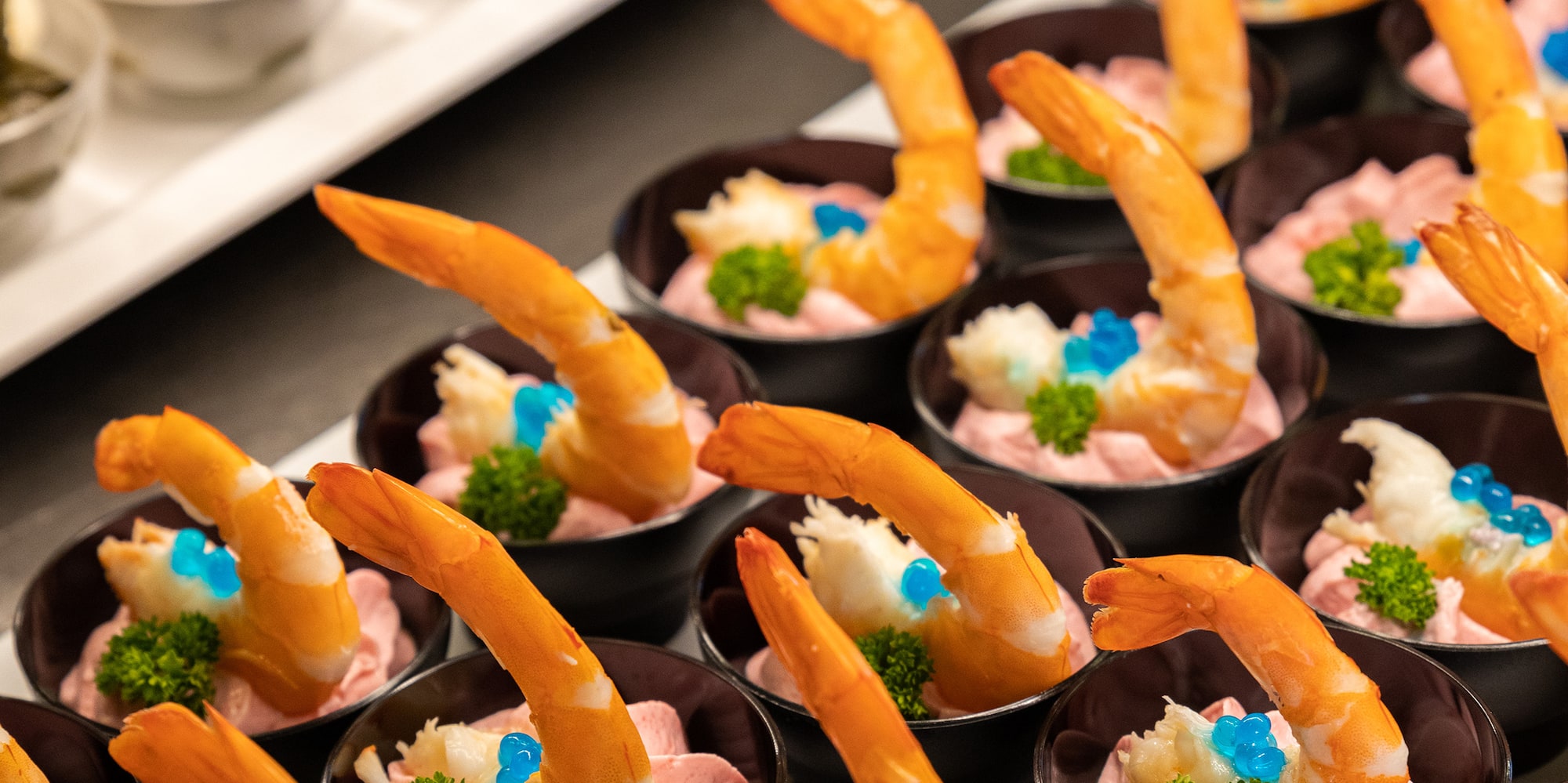 a tray of shrimp appetizers