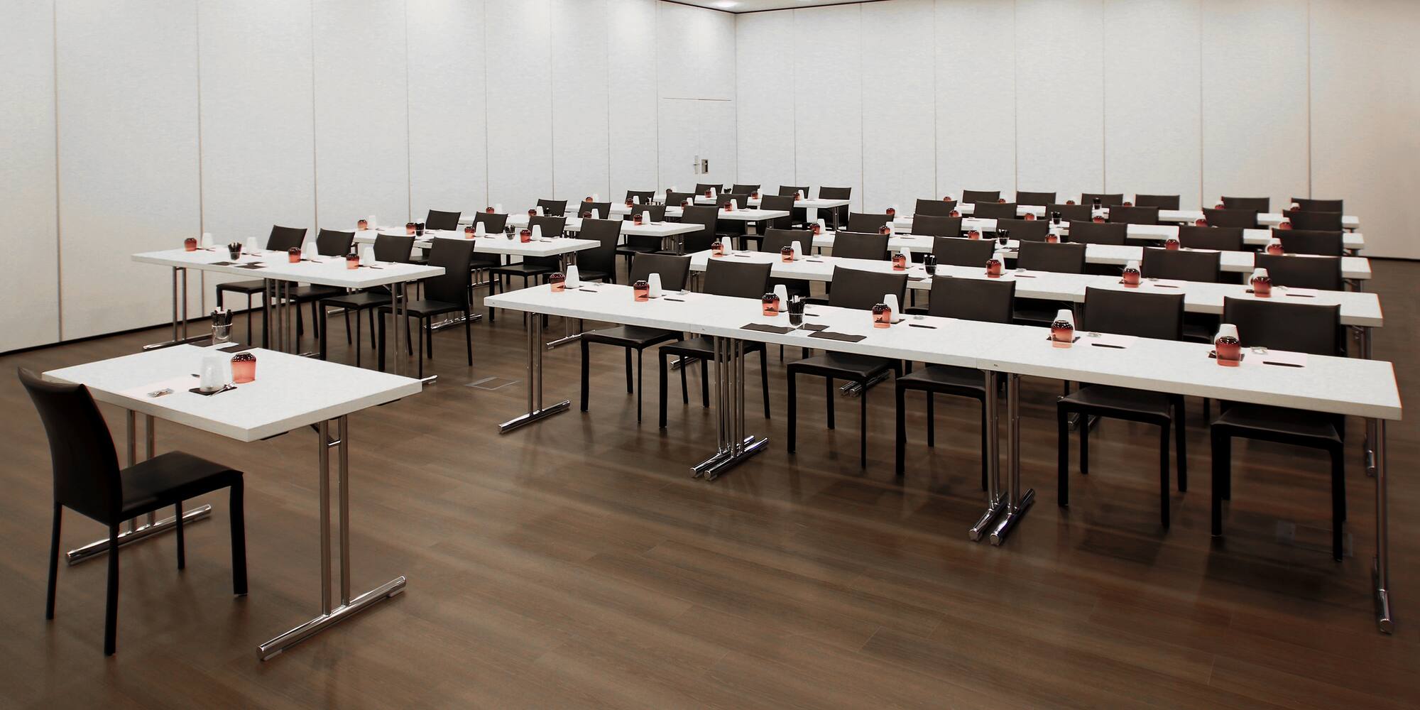 a room with tables and chairs