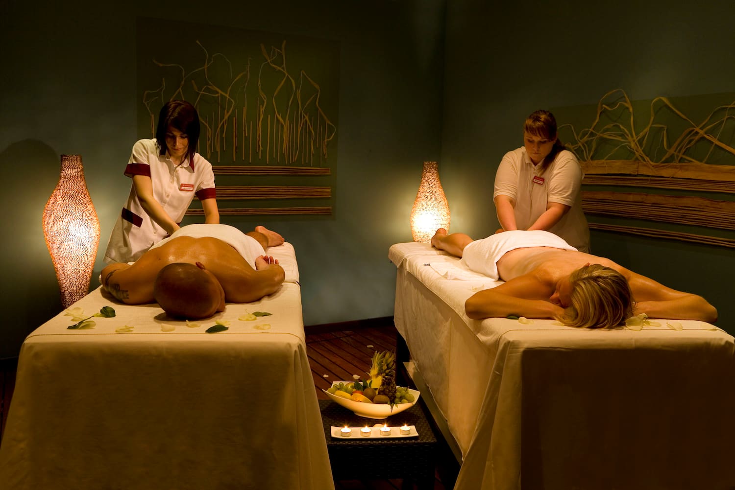 a group of people getting a massage