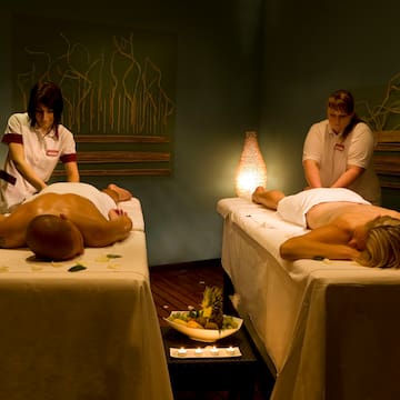 a group of people getting a massage