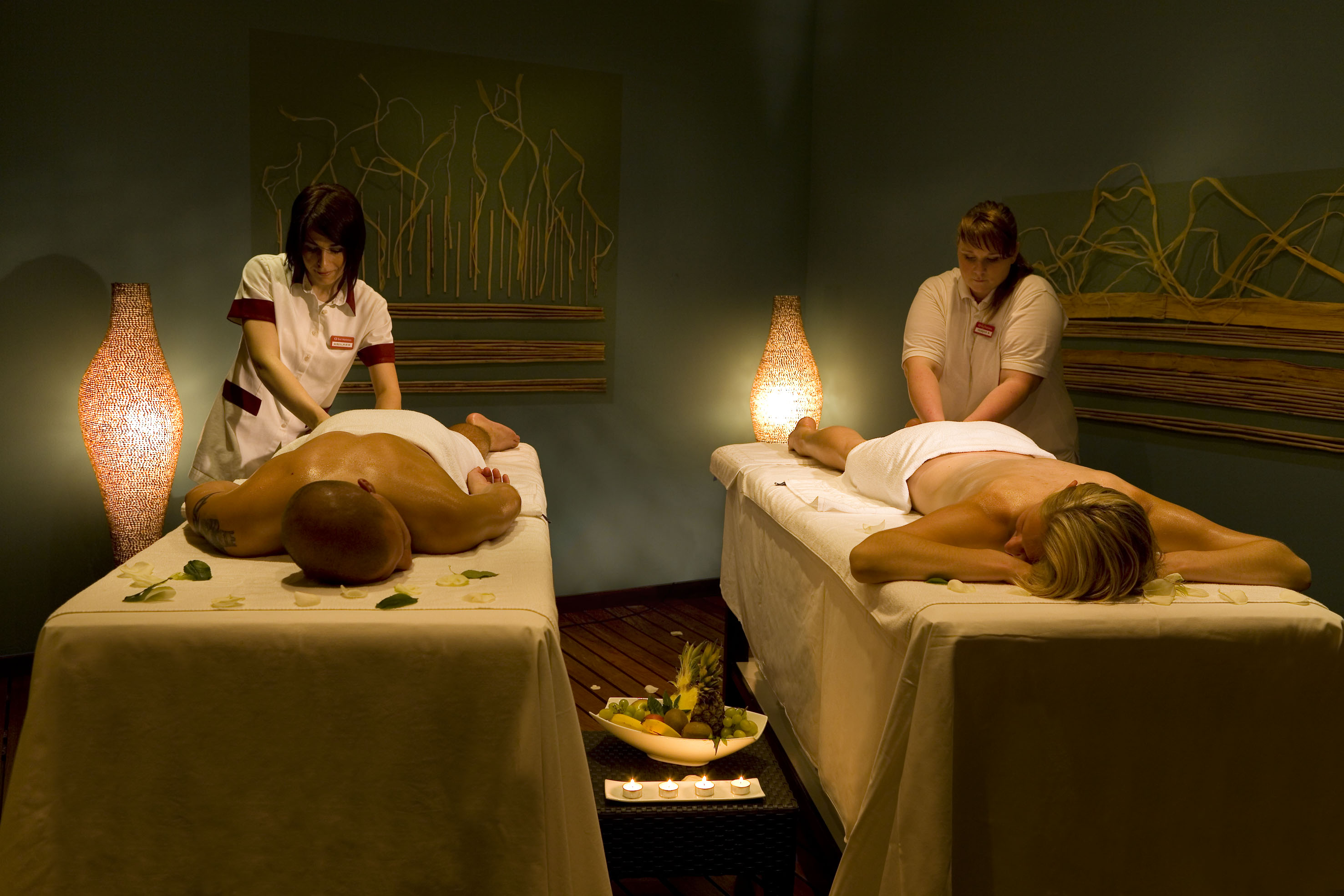 a group of people getting a massage