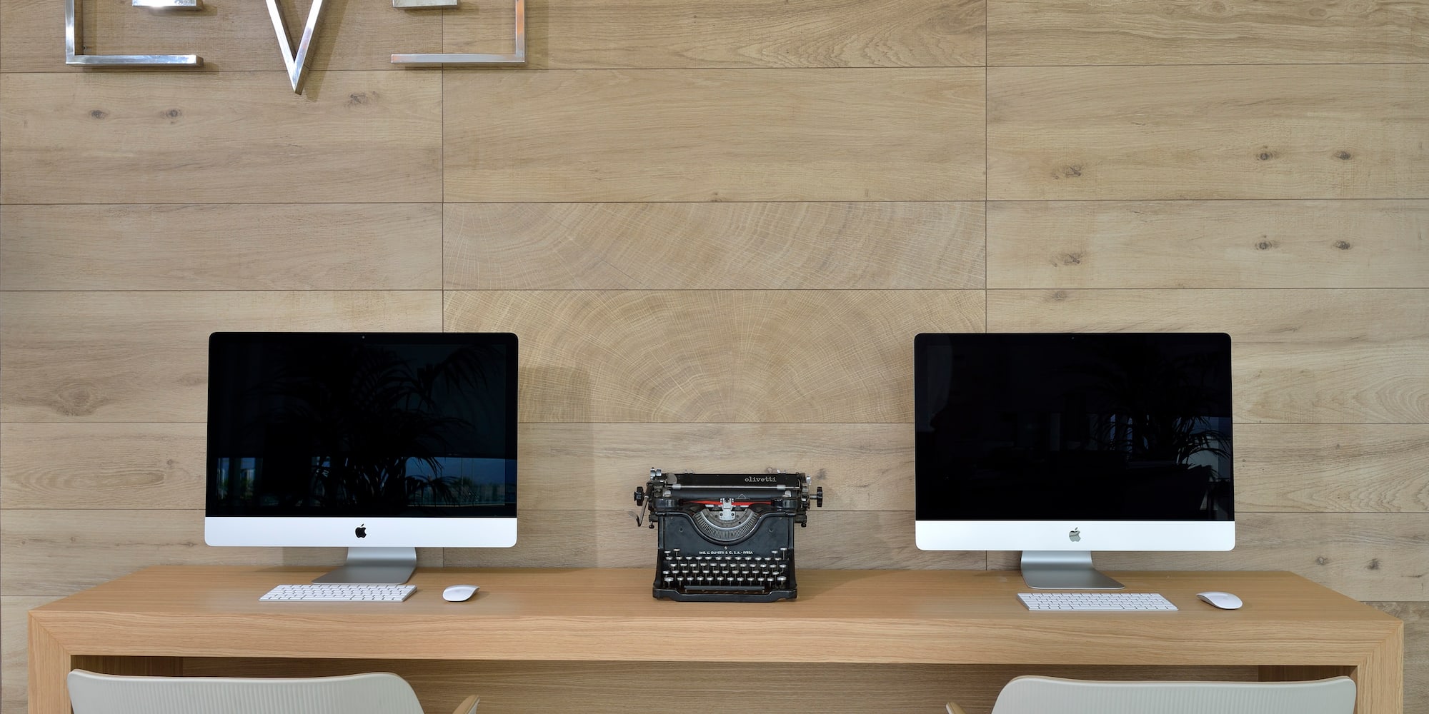 two computers on a desk