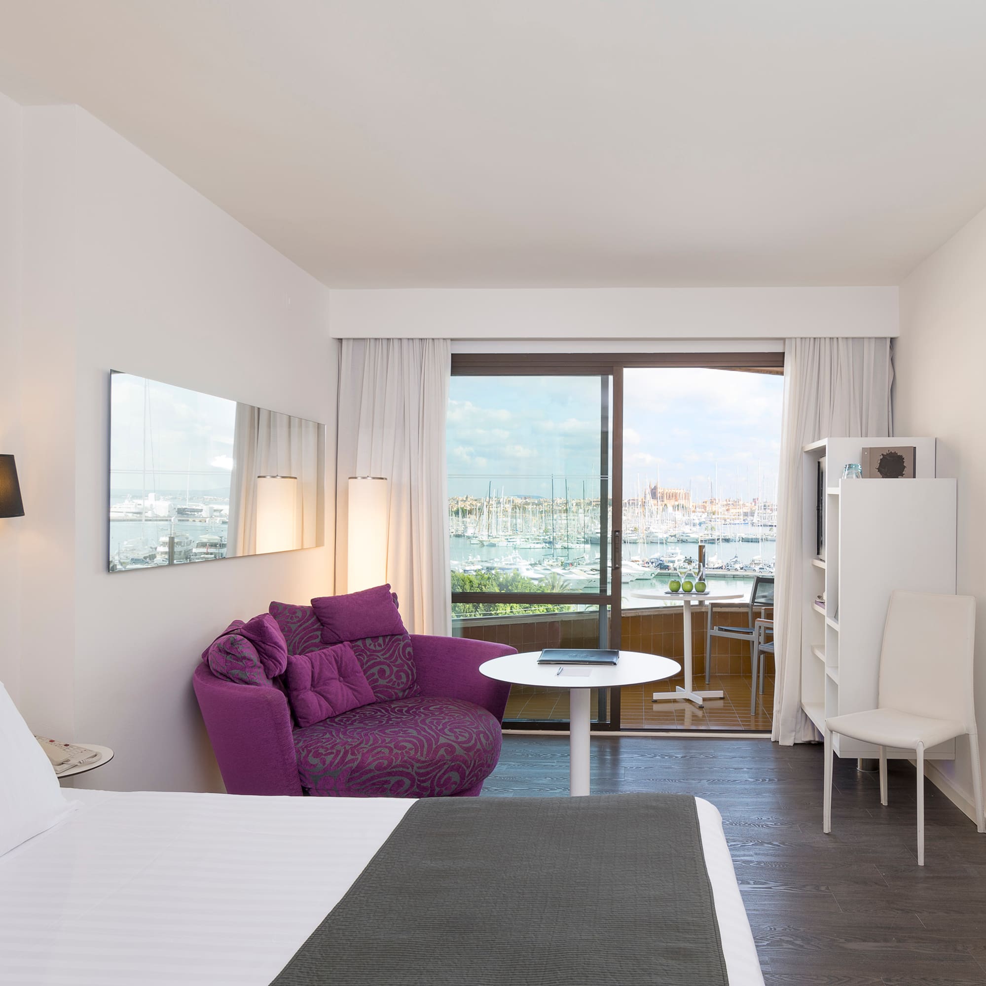 a room with a bed and a chair