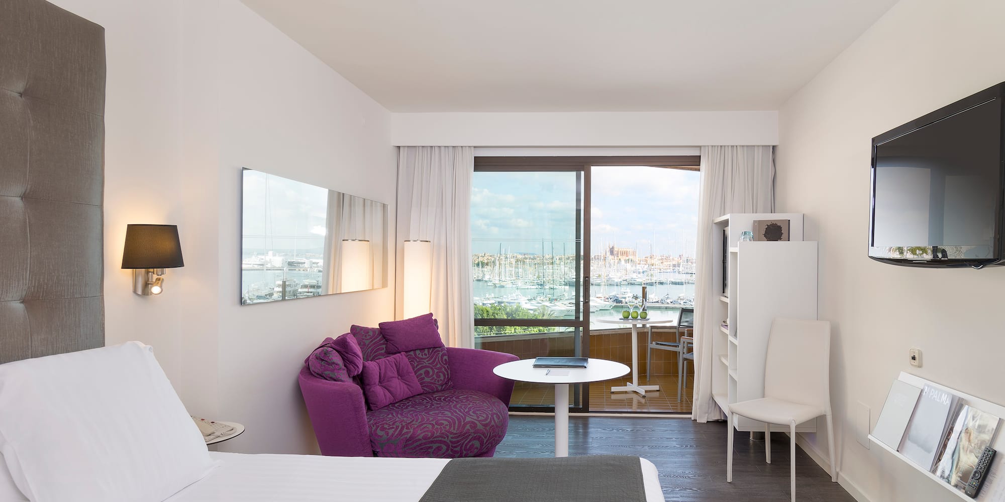 a room with a bed and a chair