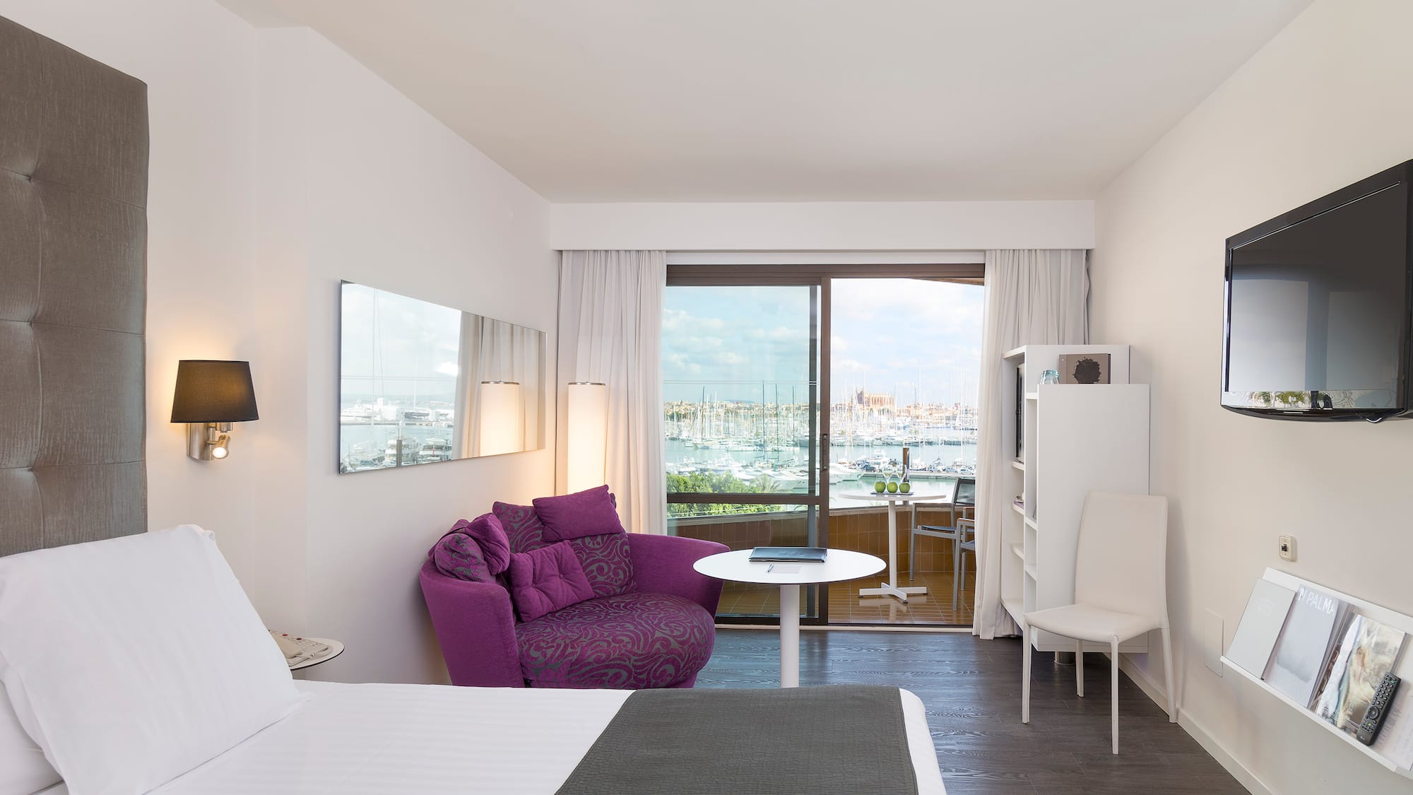 a room with a bed and a chair