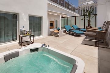 a hot tub on a patio