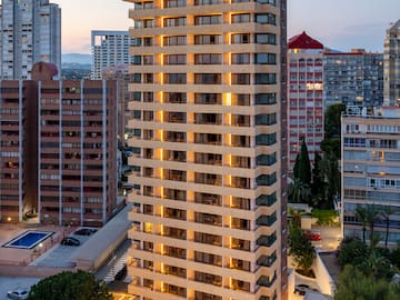 a tall building with lights on it