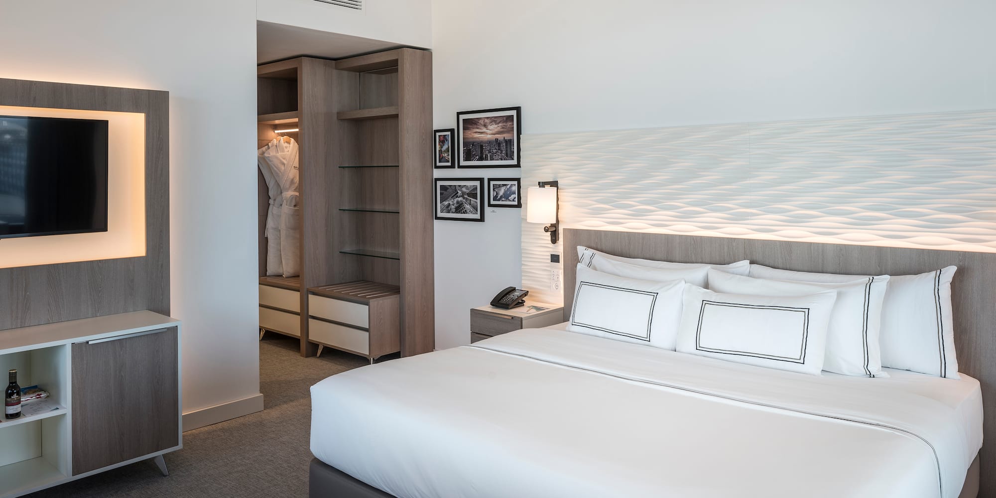 a bedroom with a bed and a closet