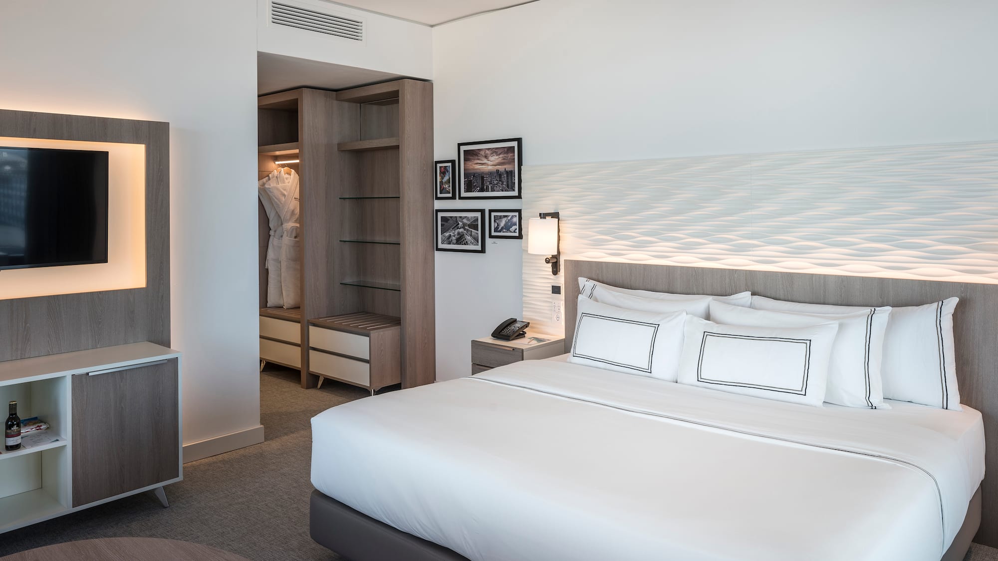 a bedroom with a bed and a closet