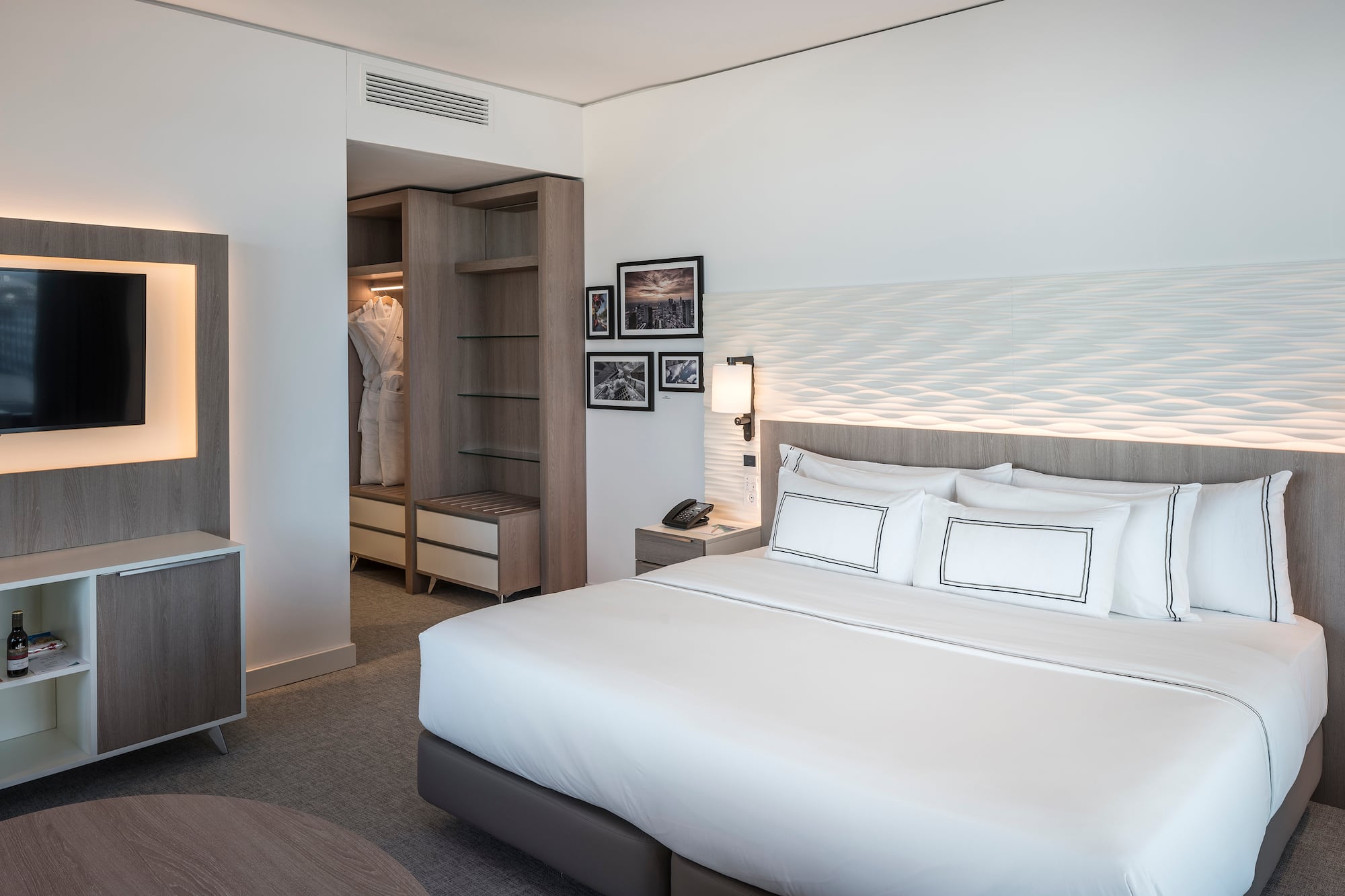 a bedroom with a bed and a closet