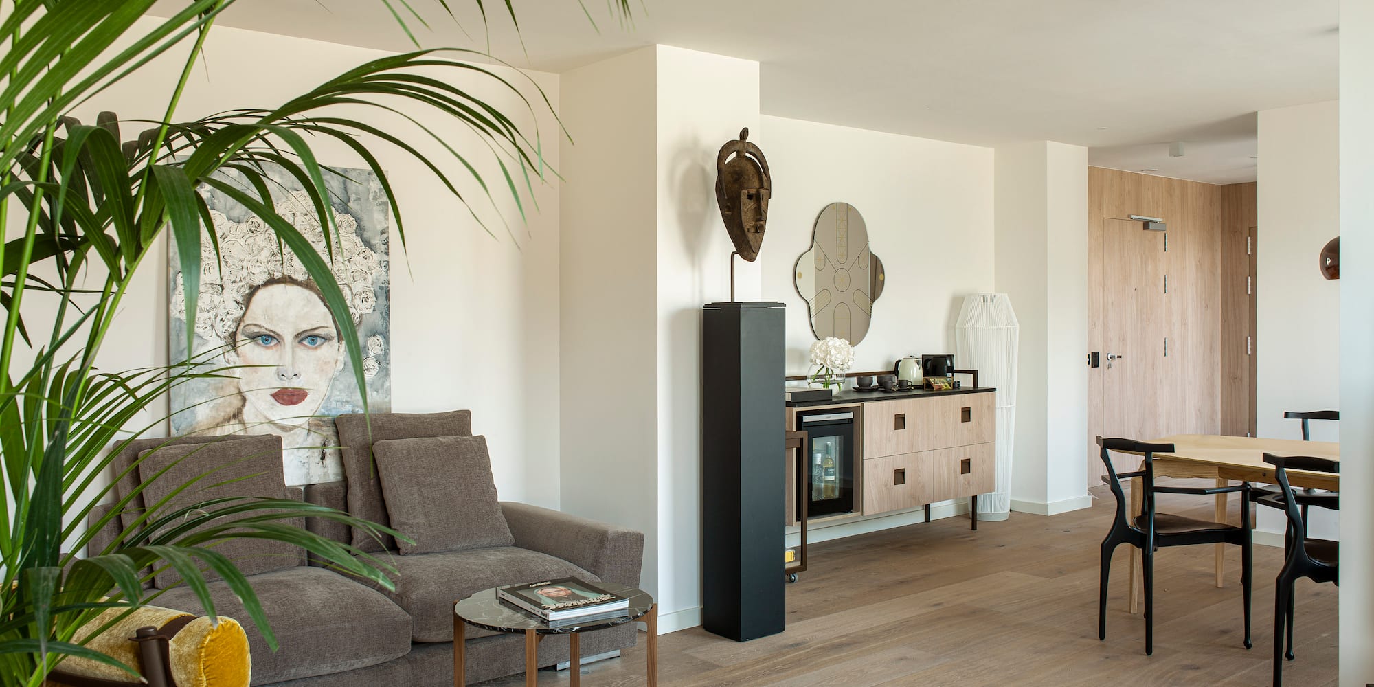 a living room with a couch and a table