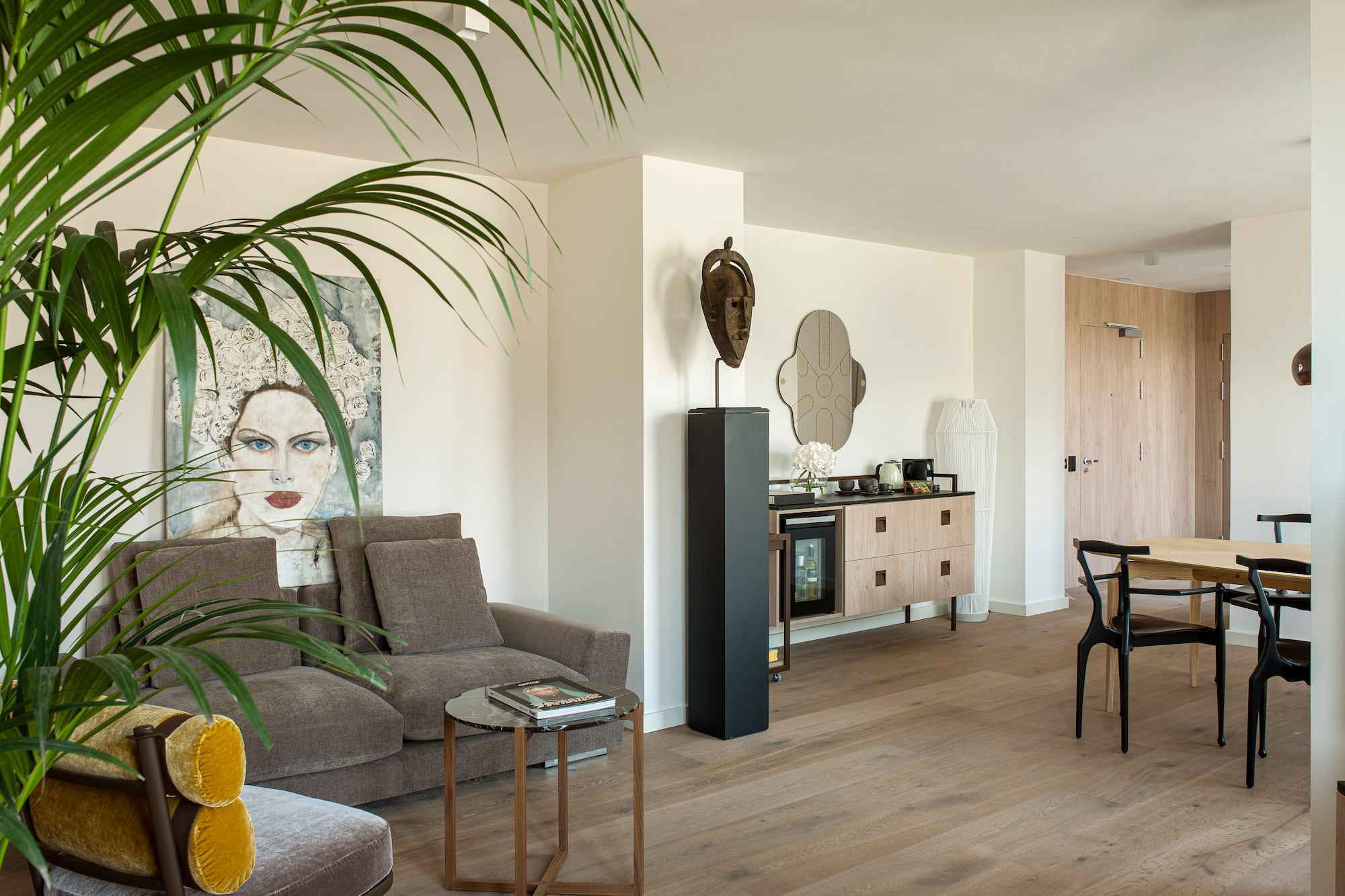 a living room with a couch and a table