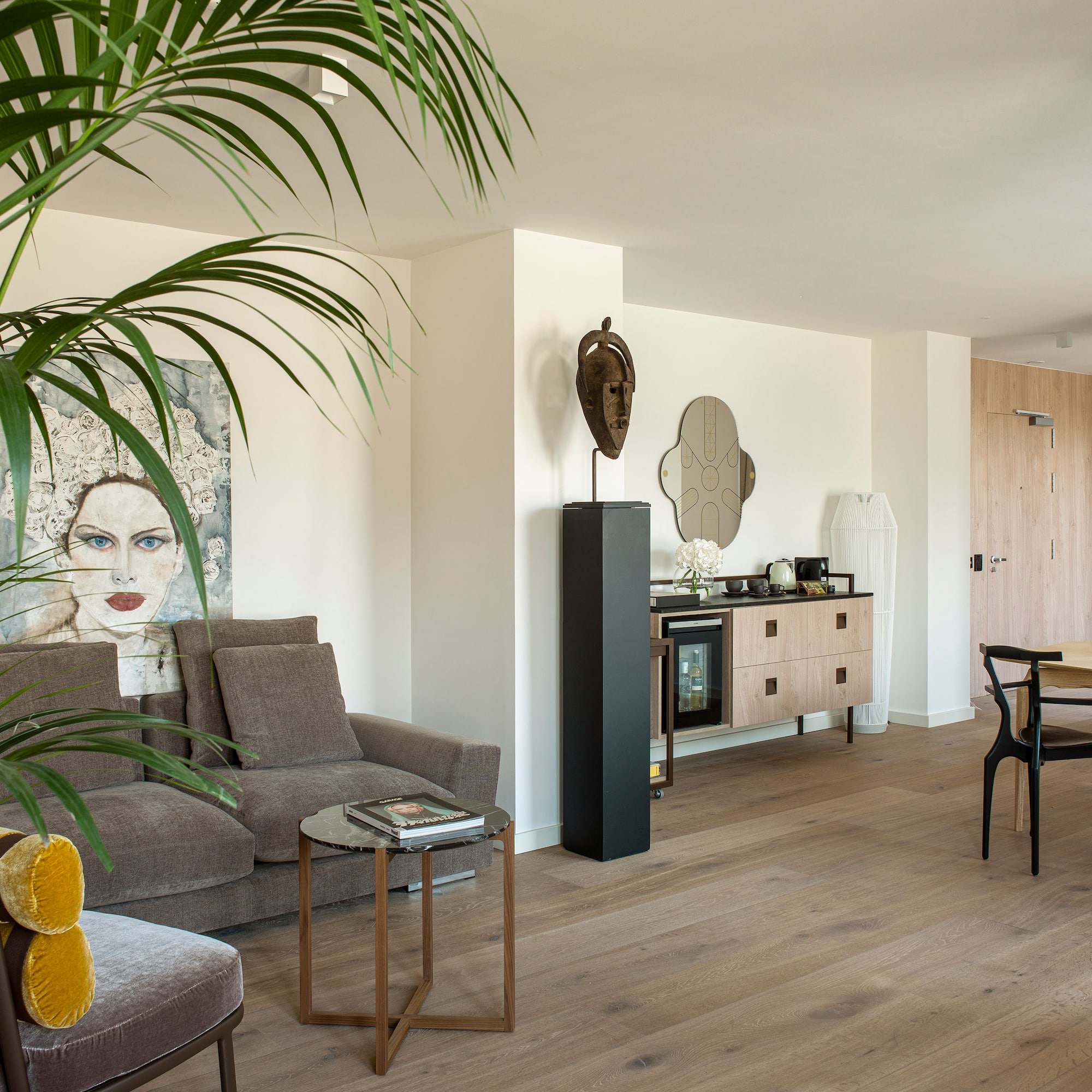 a living room with a couch and a table