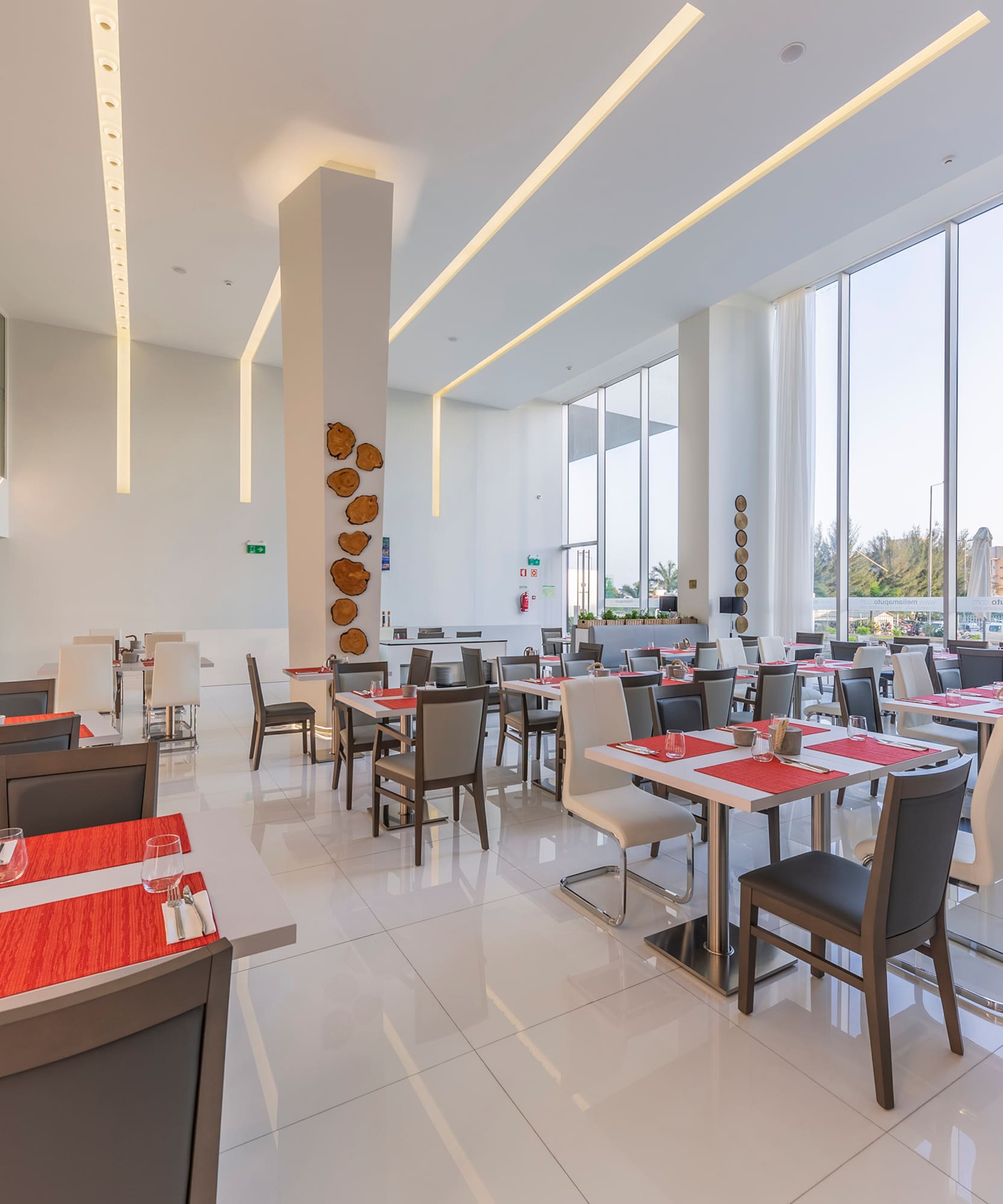 a large room with tables and chairs