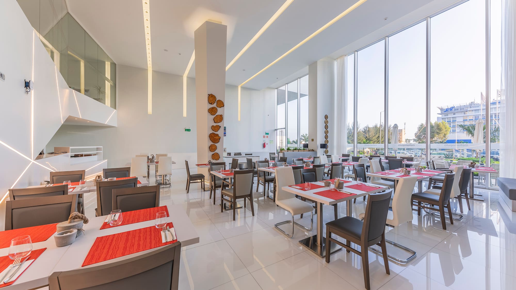 a large room with tables and chairs