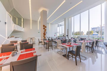 a large room with tables and chairs