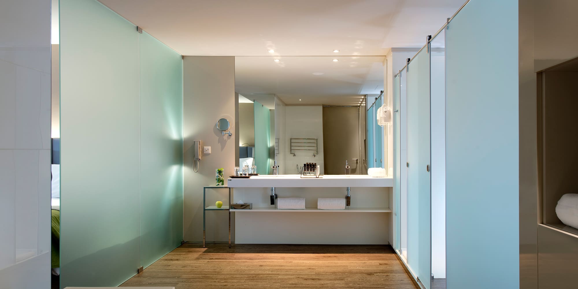 a bathroom with a mirror and sink